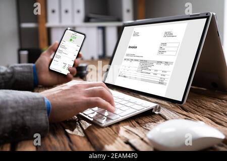 Digital Invoice Document On Tablet Or Laptop Stock Photo