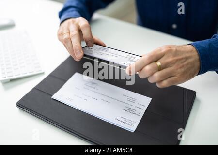 Remote Check Deposit Using Mobile Photo. Scanning Documents Stock Photo