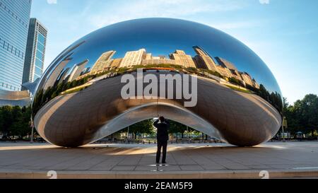 CHICAGO - SEPTEMBER 09: The mirrored sculpture popularly known as the Bean (Cloud Gate, by Anish Kapoor), has become one of Chicago's most popular att Stock Photo