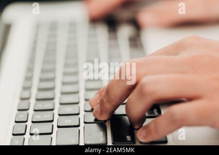 Close-Up Shot of Human Hands Placed Over Laptop Stock Photo