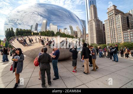 CHICAGO - SEPTEMBER 09: The mirrored sculpture popularly known as the Bean (Cloud Gate, by Anish Kapoor), has become one of Chicago's most popular att Stock Photo