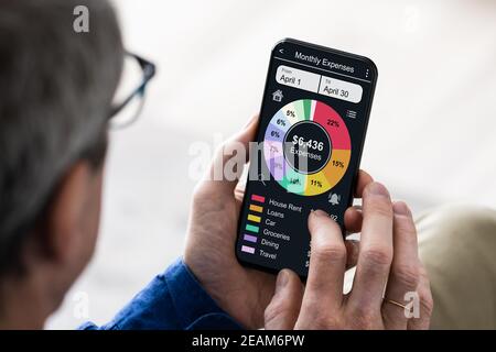 Online Budget Tracking App On Mobile Phone Stock Photo