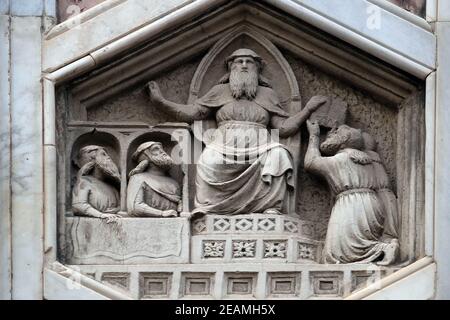 King Phoroneus as personification of the beginning of the law making from the workshop of Andrea Pisano, Relief on Giotto Campanile of Cattedrale di Santa Maria del Fiore (Cathedral of Saint Mary of the Flower), Florence, Italy Stock Photo
