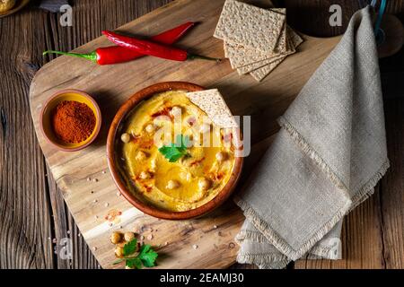 Delicious hummus paste with lemon and chilli Stock Photo
