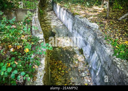 Storm runoff in the highlands. Protection from water flow. Stock Photo