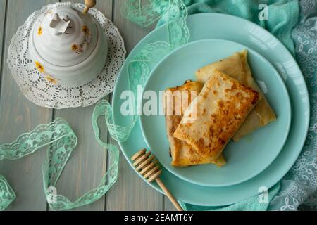 Apple jam filled dessert roll, belarusian crepe. Flat lay Stock Photo