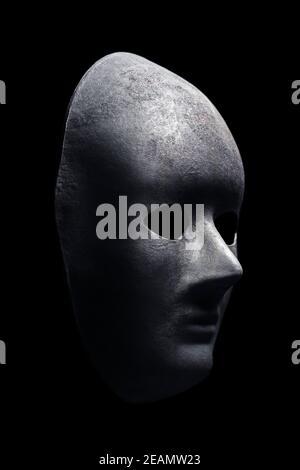 Black mask isolated on black background Stock Photo