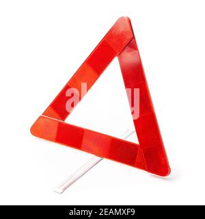 Collapsible red road triangle isolated on white background Stock Photo