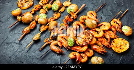 Grilled shrimp and mussels skewers Stock Photo