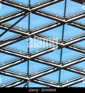 Glass architecture. Close-up photo of contemporary hi-tech architectural detail. Stock Photo
