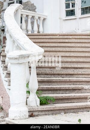 old stone stairs at an abandoned old building. Selective focus Stock Photo