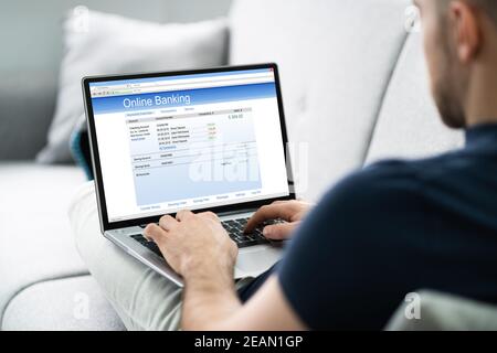 Man Using Online Bank Stock Photo
