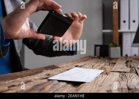 Remote Check Deposit. Scanning Documents Stock Photo