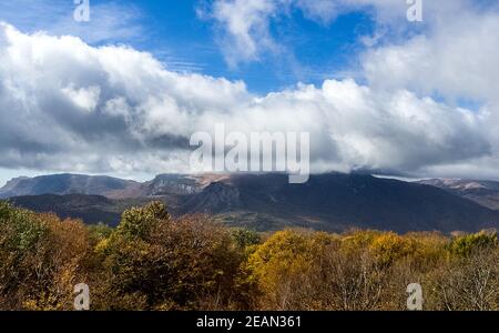 Mountains and forests of Crimea. coniferous and deciduous trees on the hills of mountains and rocks Stock Photo