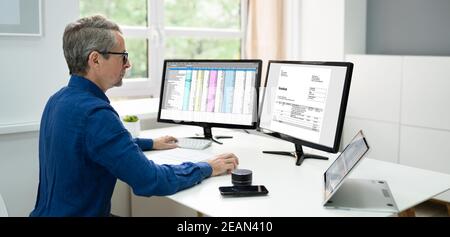 Digital Invoice Bill On Computer Stock Photo