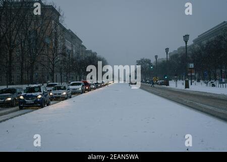 BERLIN, GERMANY - Feb 08, 2021: Cars stuck in heavy traffic while snow storm Stock Photo