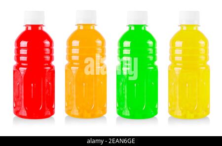 colored juice in a plastic container jug isolated on a white background. Stock Photo