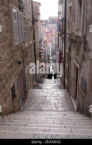 Narrow street inside Dubrovnik old town, Croatia Stock Photo