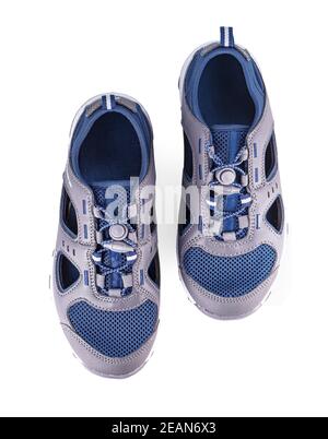 Pair of blue sneakers isolated on white background Stock Photo