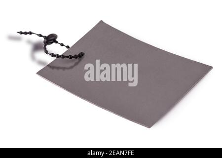 Blank tag tied with string. Price tag, gift tag, sale tag, address label Stock Photo