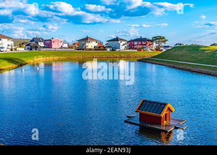 Duck house at a moat around town Fredrikstad in Norway Stock Photo