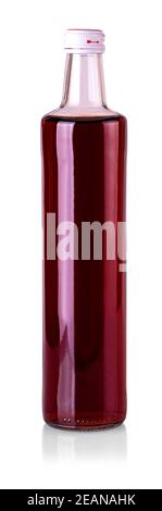 glass bottle of sweet red drink on white background Stock Photo