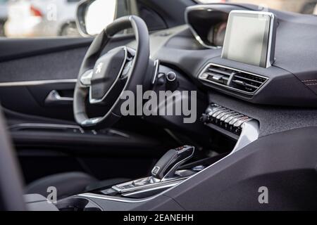 MOSCOW, RUSSIA - MARCH 15, 2020: steering wheel and driver's seat in the interior of new SUV Peugeot 3008. Stock Photo
