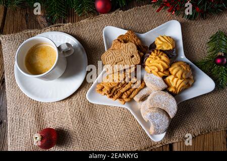Different types of biscuits with rustic Christmas decorations Stock Photo