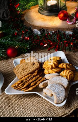 Different types of biscuits with rustic Christmas decorations Stock Photo