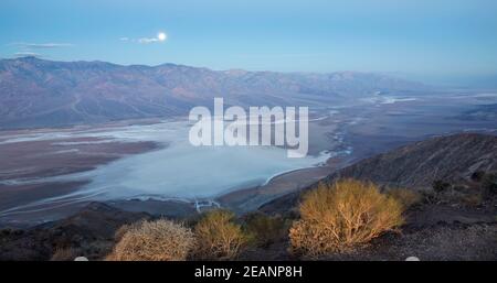 Panoramic view by moonlight over Badwater Basin to the Panamint Range, Dante's View, Death Valley National Park, California, United States of America Stock Photo