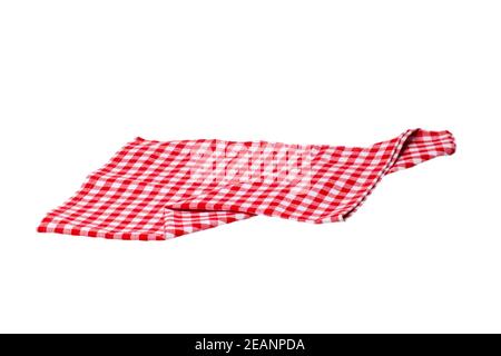 Towels isolated. Close-up of red and white checkered napkin or picnic tablecloth texture isolated on a white background. Kitchen towel. Stock Photo