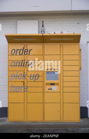 DONCASTER, UK - JANUARY 29,, 2021.  An Amazon Locker which is a secure kiosk where people can pick up their parcel or package with convenience Stock Photo