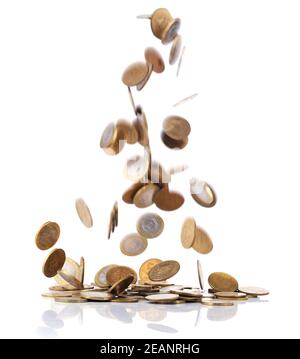 Shiny golden coins falling on white background Stock Photo - Alamy