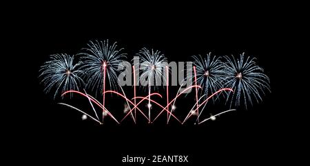 Fireworks sparkling on night sky celebration. Stock Photo