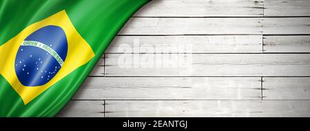Brazilian flag on old white wall banner Stock Photo