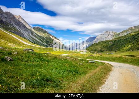 Mountain and hiking path landscape in French alps Stock Photo