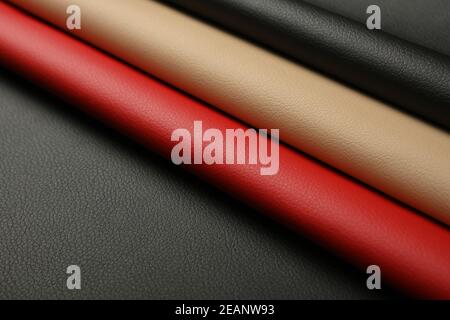 Background of black, red and beige white leather Stock Photo