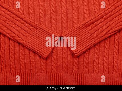 Background texture of red knitted wool fabric Stock Photo