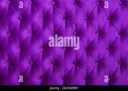 Violet capitone tufted fabric upholstery texture Stock Photo