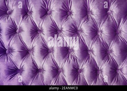 Violet capitone tufted fabric upholstery texture Stock Photo