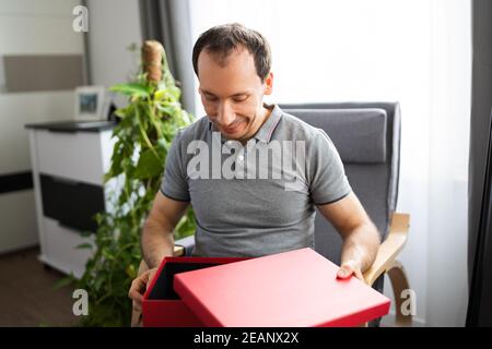 Happy Man Sitting Stock Photo