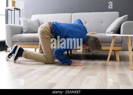 Lost Something. Looking For Wallet Stock Photo