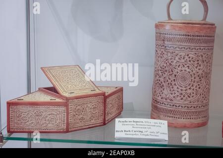 Ancient caskets made wood and birch trees. Russian culture. Stock Photo