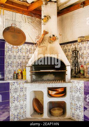 Outdoor summer kitchen in a classic Spanish villa in Moraira, Spain Stock Photo