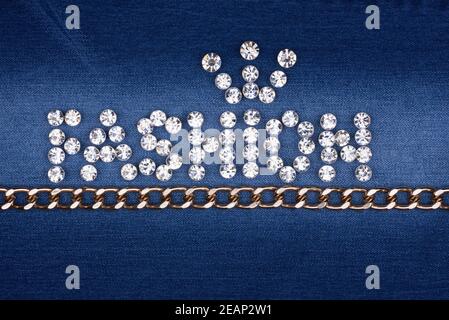 The word 'fashion' made by â€‹â€‹with rhinestones and gold chain Stock Photo