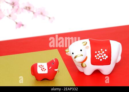 Dolls of Usi Cow. Japanese new year card. Japanese new year cow object Stock Photo