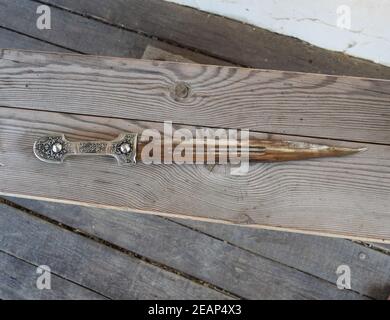 Cossack cutlass on the bench Stock Photo