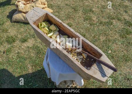 Wooden trough for cutting cabbage Stock Photo