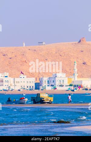 Local fishermen are bringing their catch on shore in Sur, Oman. Stock Photo