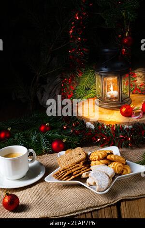 Different types of biscuits with rustic Christmas decorations Stock Photo